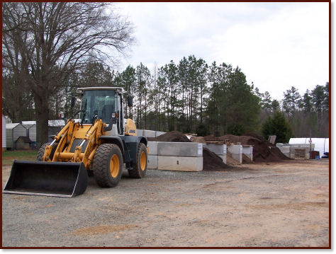 front loader and full mulch bins